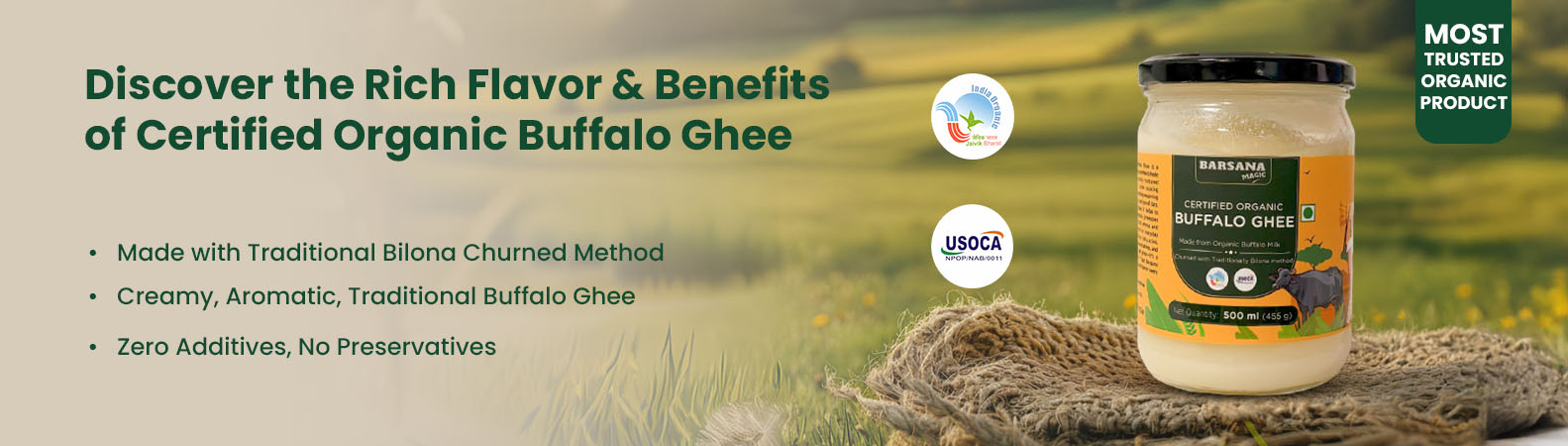 Barsana Magic and Container of buffalo ghee with a green field background