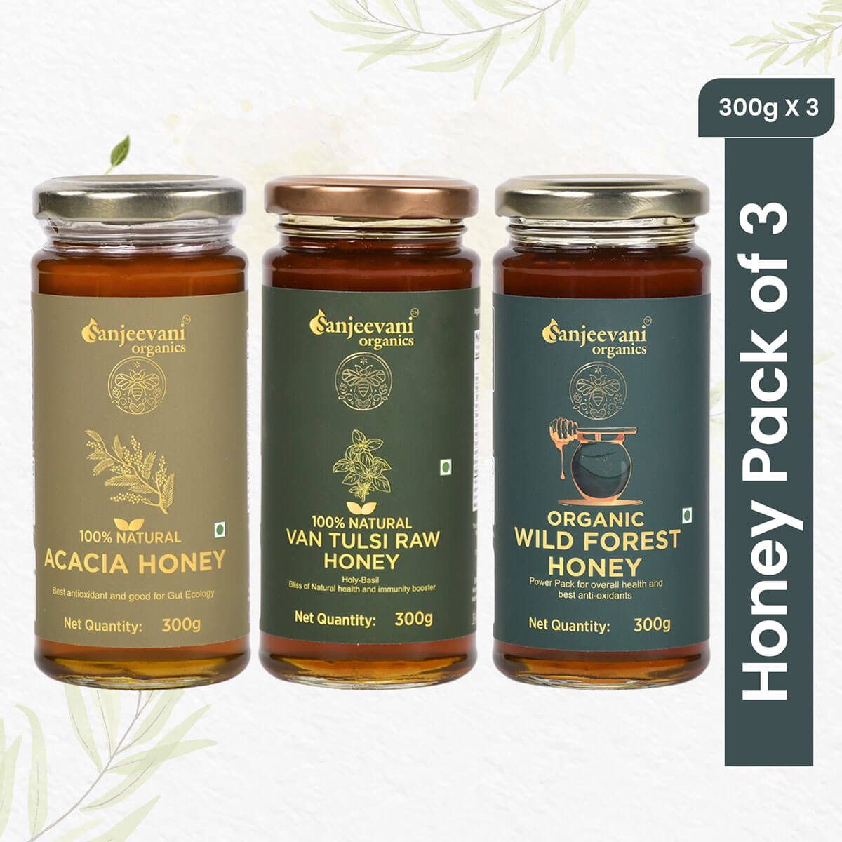 Three jars of natural honey—Wild Forest, Van Tulsi, and Acacia—arranged together, showcasing their golden, amber hues.
