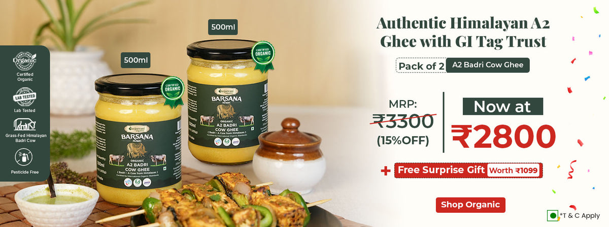 Barsana Magic and ghee jars with promotional text on a wooden table