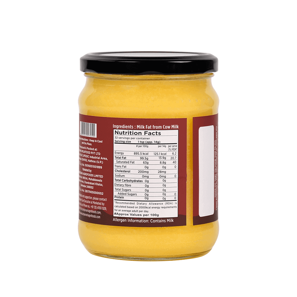Golden Barsana Magic Organic Cow Ghee in a 500ML jar, showcasing its rich, pure texture and traditional essence.
