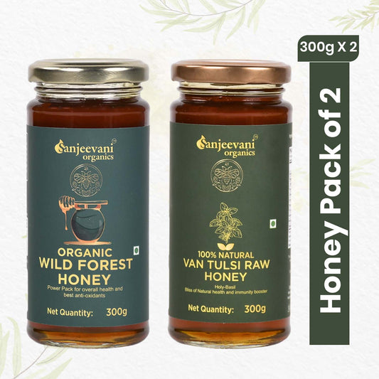 Two jars of Sanjeevani Organics Honey Combo, featuring golden Wild Forest Honey and aromatic Van Tulsi Honey, on a natural backdrop.