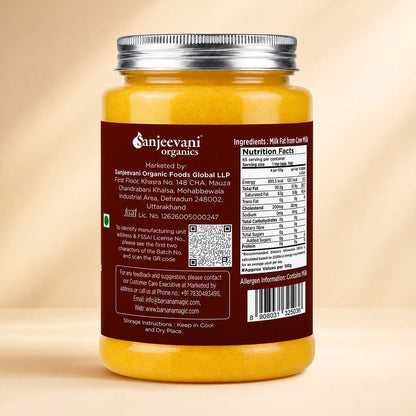 Barsana Magic and A jar of Sanjeewan Organics milk powder with a dark brown label and silver lid, shown from the back against a warm beige background.