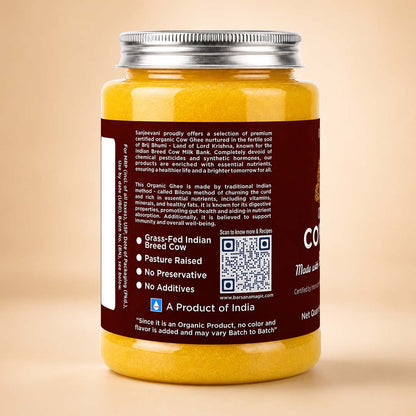 Barsana Magic and A yellow plastic bottle of Sendviroy Organic Cow Ghee with a silver metal cap, showing the back label with product details and a QR code, set against a solid beige background.