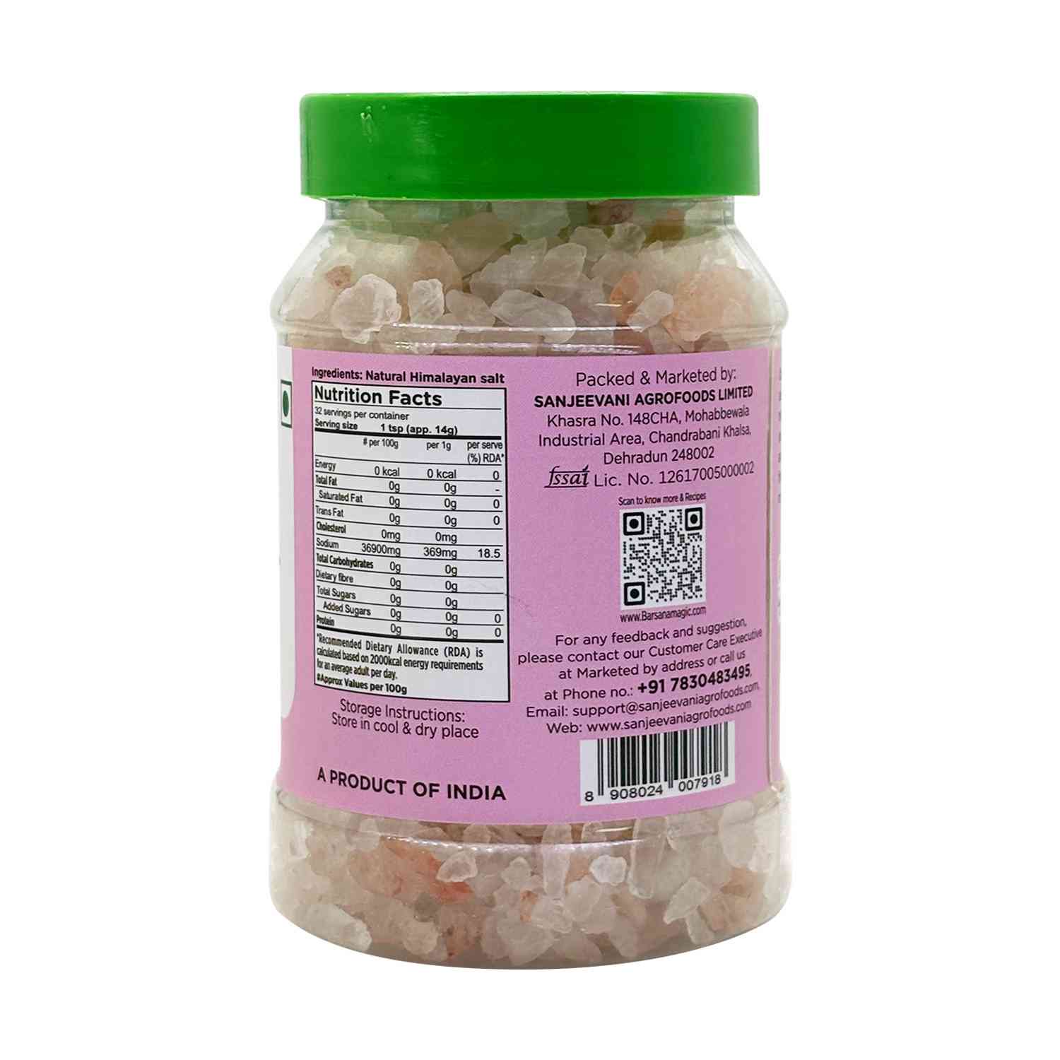 Barsana Magic and Jar of natural Himalayan salt with a pink label and green lid on a white background