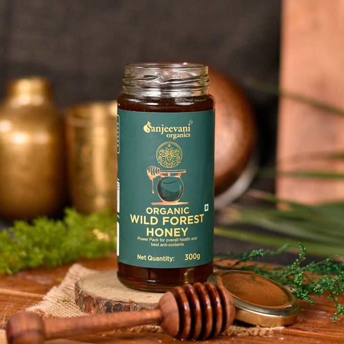 Barsana Magic | Pure Organic Wild Forest Honey in a clear glass jar, showcasing its golden, velvety texture from untouched, pristine forests.