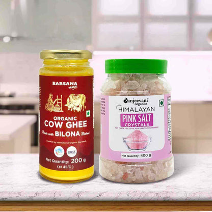 Barsana Magic and Two jars of organic cow ghee and Himalayan pink salt on a kitchen counter.