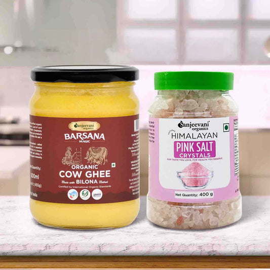 Barsana Magic and Two jars of Barsana Organic Cow Ghee and Sanjeevani Himalayan Pink Salt Crystals on a kitchen counter.