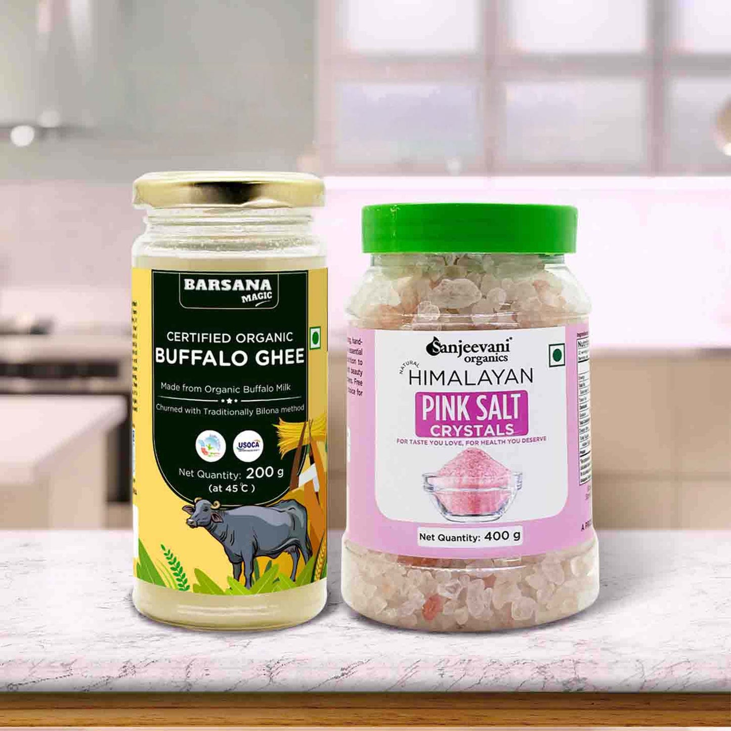 Barsana Magic and Two jars of Organic Buffalo Ghee and Sanjeevani Himalayan Pink Salt on a kitchen counter.