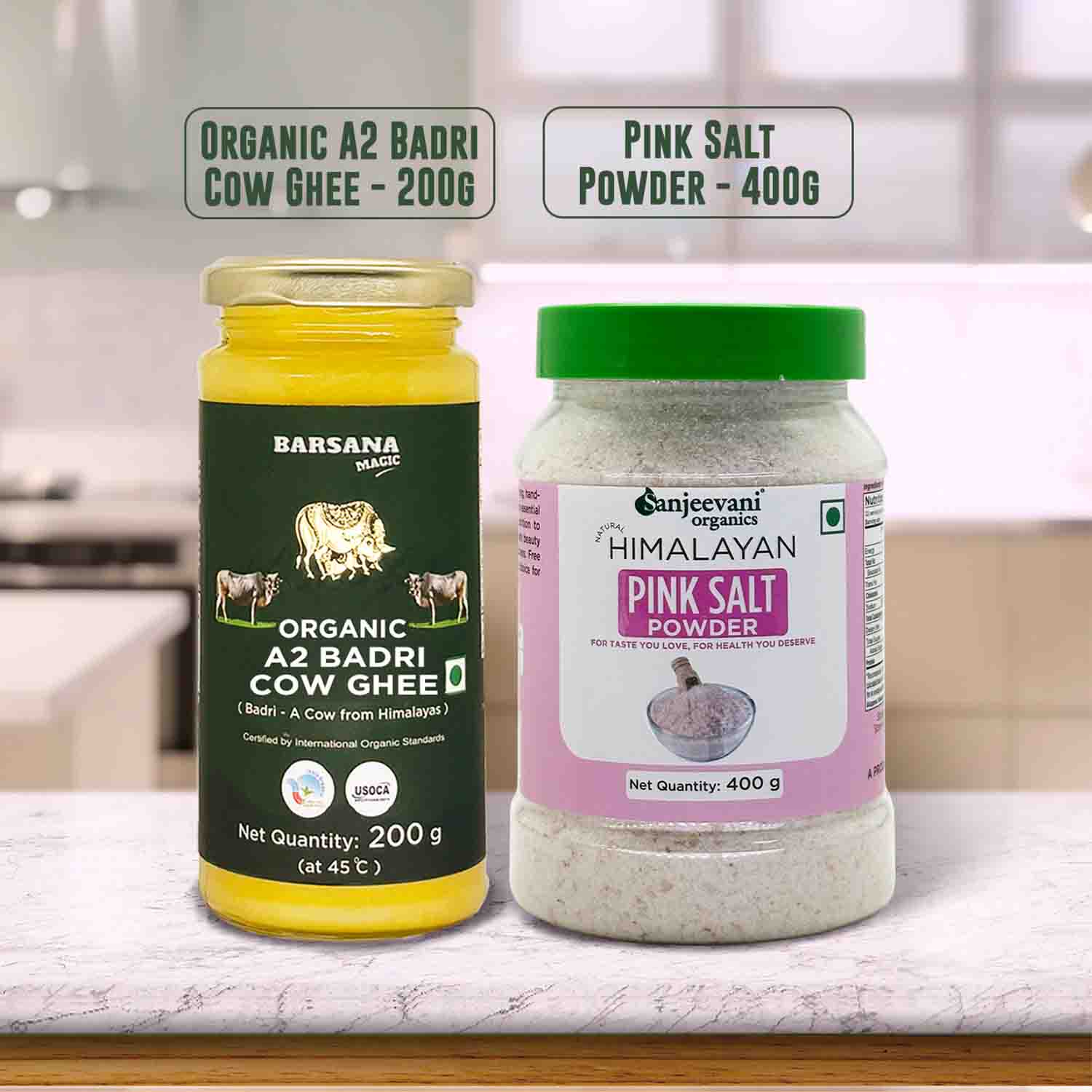 Barsana  Magic and Two containers of organic cow ghee and pink salt powder on a kitchen counter.