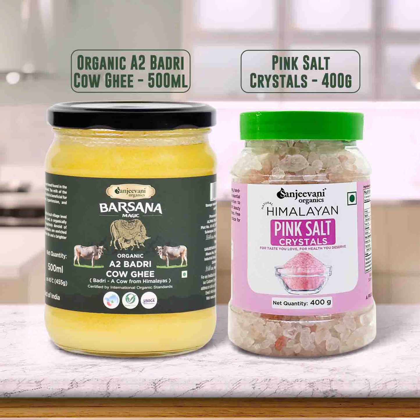 Barsana Magic and Two jars of Organic A2 Badri Cow Ghee and Sanjeevani Himalayan Pink Salt Crystals on a kitchen counter.