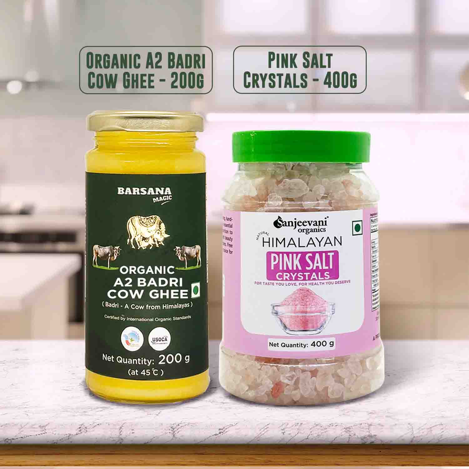 Barsana Magic and Two jars of organic ghee and pink salt crystals on a kitchen counter