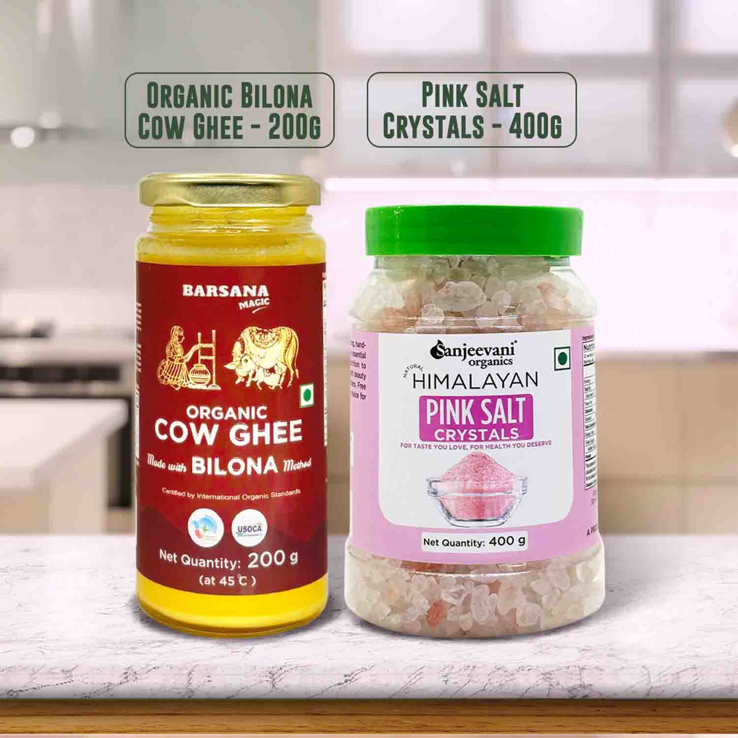 Barsana Magia and Two jars of organic cow ghee and pink salt crystals on a kitchen counter.