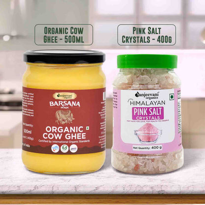Barsana Magic and Two jars of organic cow ghee and pink salt crystals on a kitchen counter.