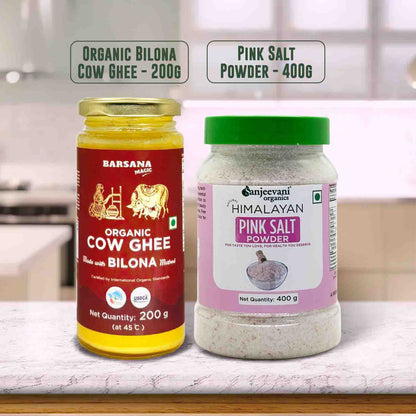 Barsana Magic and Two containers of organic cow ghee and pink salt powder on a kitchen counter.