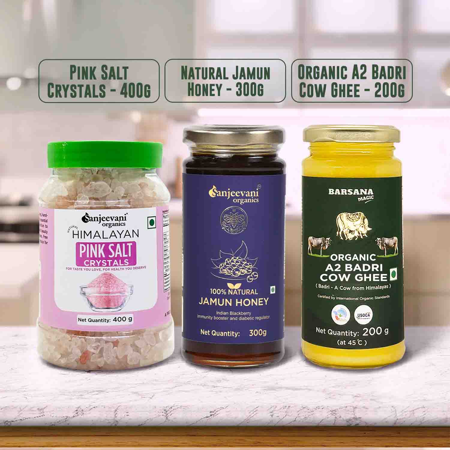 Barsana Magic and Three jars of different products on a kitchen counter with labels and quantities displayed.