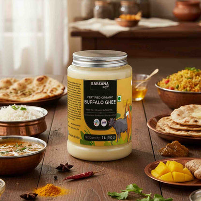 Barsana Magic and Jar of Organic Buffalo Ghee on a wooden table with food items in the background