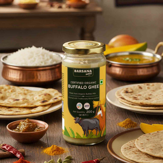 Barsana Magic and Jar of Certified Organic Buffalo Ghee on a table with flatbreads and spices