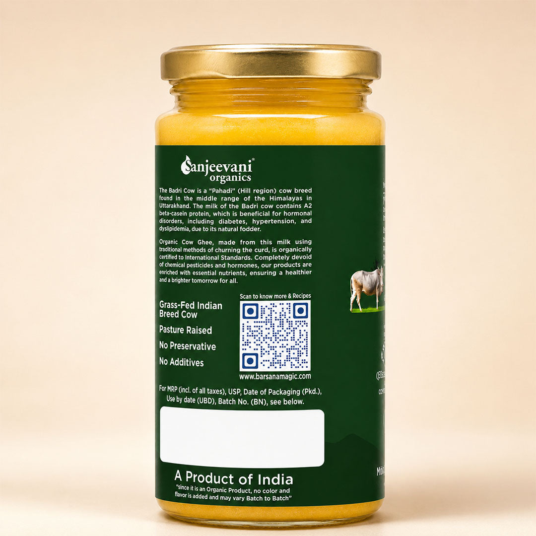 Barsana Magic and A jar of Anjeecani Organics Grass-Fed Indian Breed Cow milk powder, showing the dark green back label with product details, a QR code, and a cow illustration, topped with a gold cap.