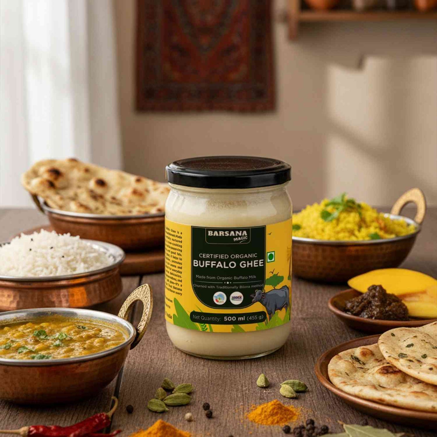 Barsana Magic and Jar of Buffalo Ghee on a table with Indian food items