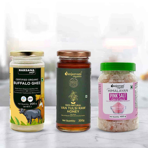Barsana Magic and Three jars of different products on a white surface with a blurred background