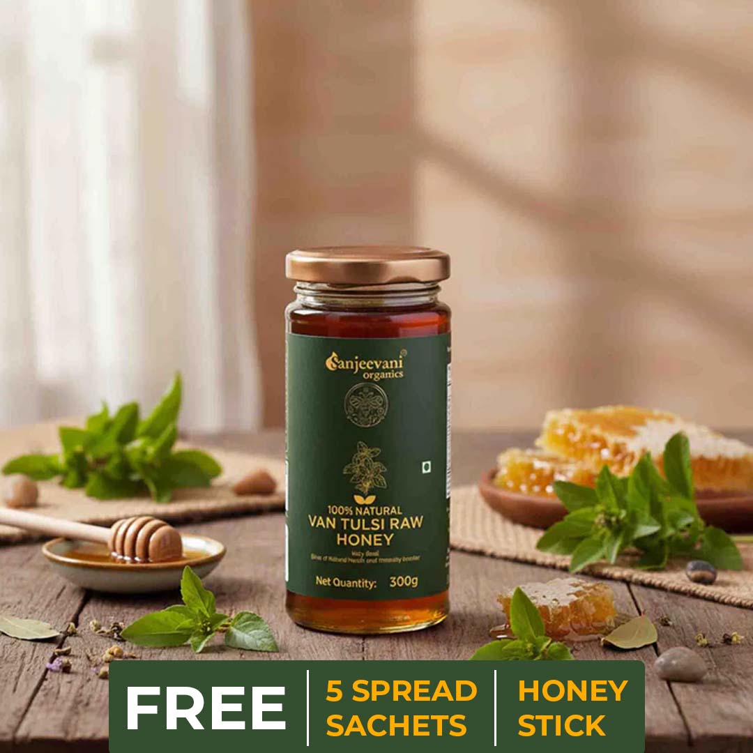 Barsana Magic and Jar of Van Tulsi Raw Honey with promotional text on a wooden table