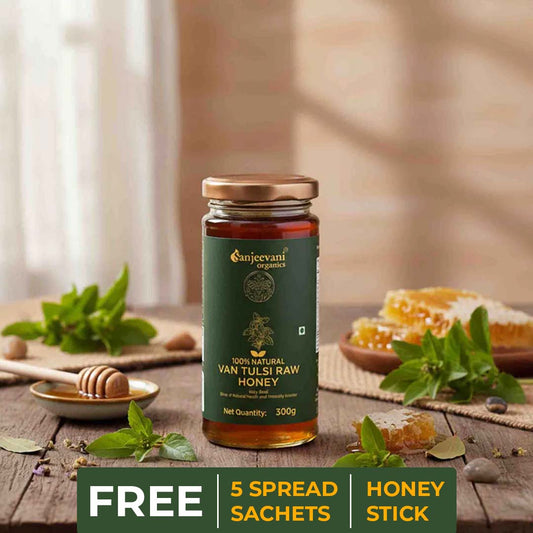 Barsana Magic and Jar of Van Tulsi Raw Honey with promotional text on a wooden table