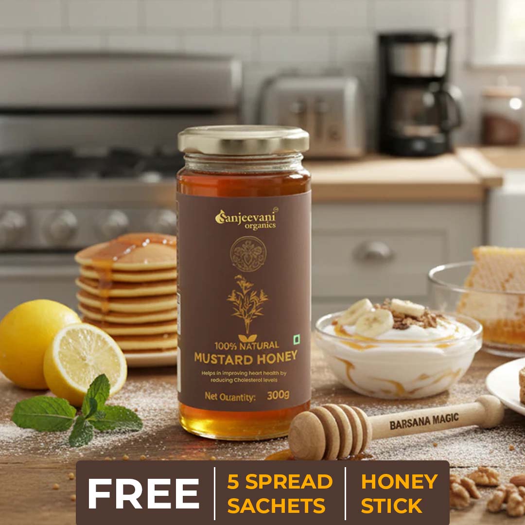 Barsana Magic and Jar of Sanjeevani Mustard Honey on a kitchen counter with pancakes, lemons, and other items.