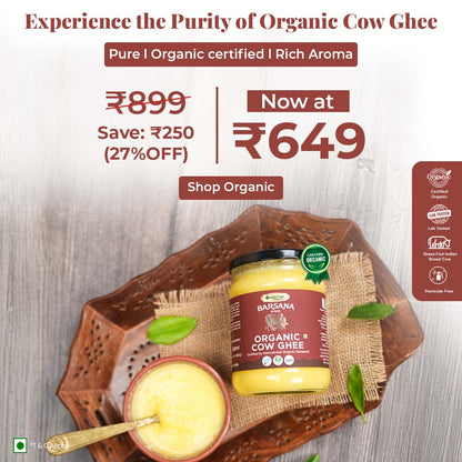 Barsana Magic and Advertisement for organic cow ghee with a jar and bowl on a wooden tray.