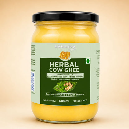 Barsana Magic and A 500ml glass jar of Bansana Herbal Cow Ghee with a black lid and a light green and dark green label, set against a solid beige background.