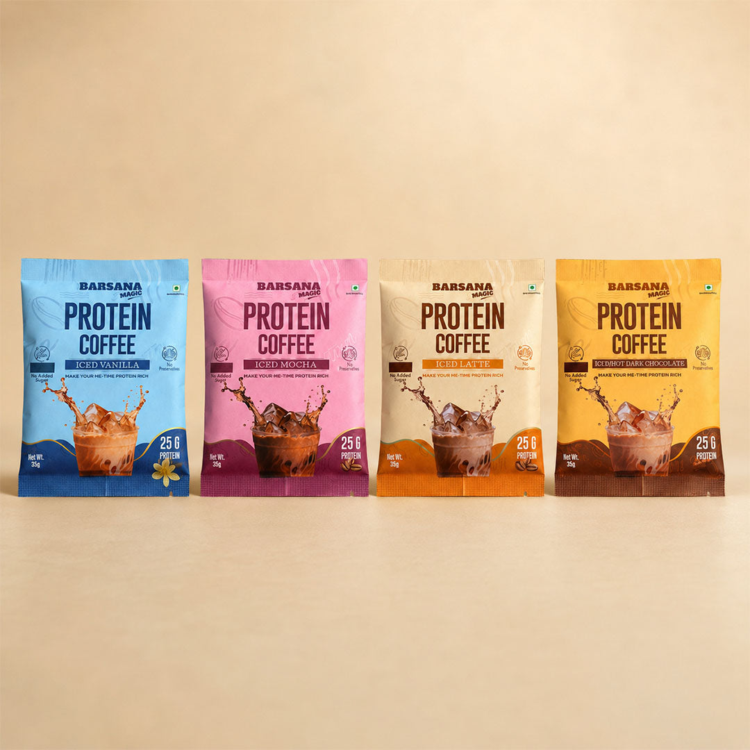 Barsana Magic and Four stand-up pouches of Barsana Protein Coffee in different flavors (Chocolate, Strawberry, Vanilla, and Coffee) lined up on a beige surface against a matching beige background.
