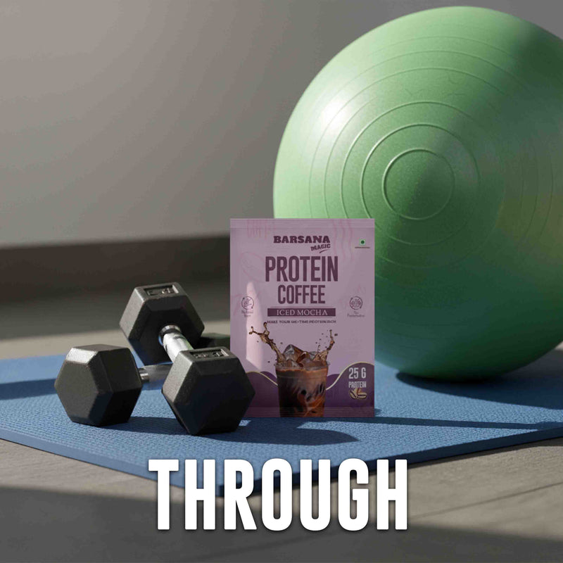 Barsana Magic and Protein coffee package with dumbbells and a fitness ball on a mat