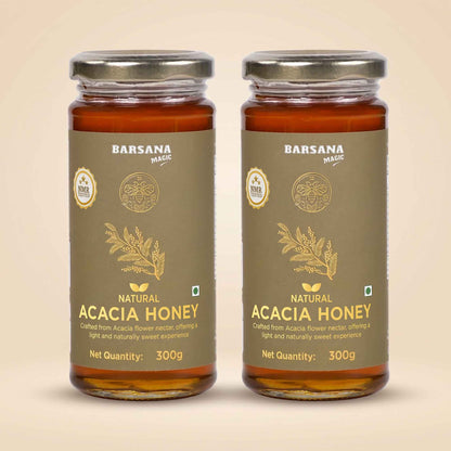 Barsana Magic and Two jars of Barsana Magic Natural Acacia Honey, 300g each, displayed side-by-side on a light beige background.