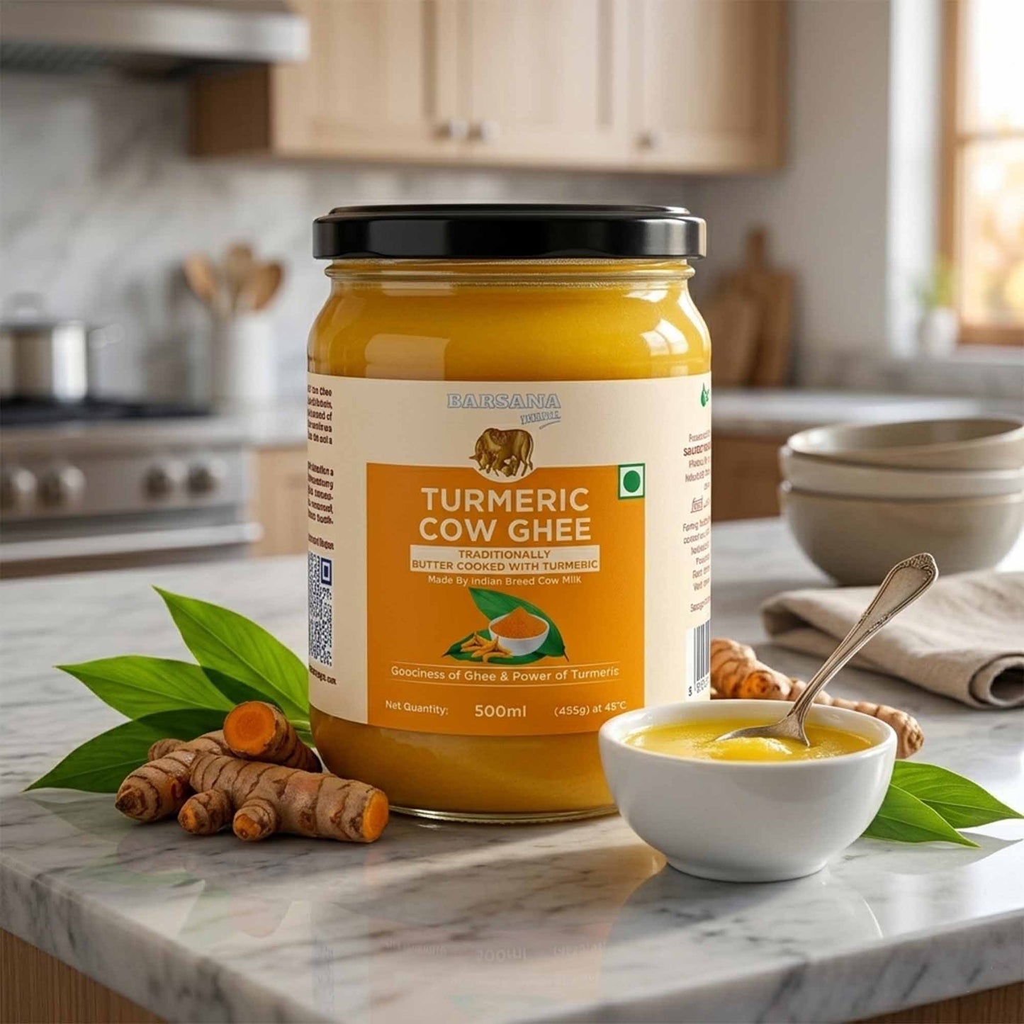 Barsana Magic and Jar of turmeric cow ghee on a kitchen counter with a bowl of ghee and turmeric roots.