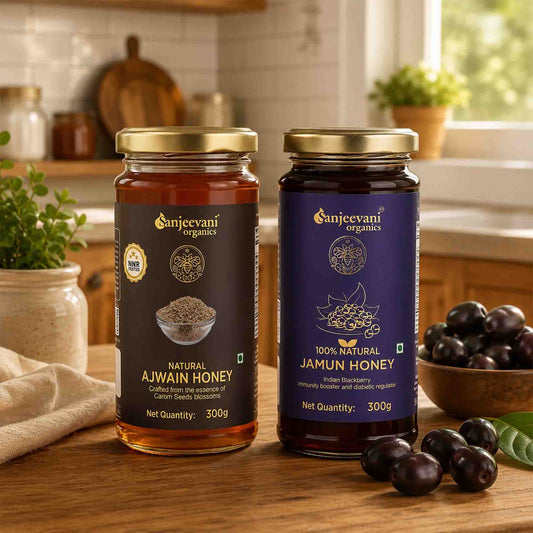 Barsana Magic and Two jars of honey from Sanjeevani Organics on a kitchen counter with Ajwain and Jamun.