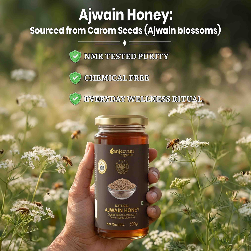 Barsana Magic and Hand holding a jar of Ajwain honey with a natural background of flowers and bees.