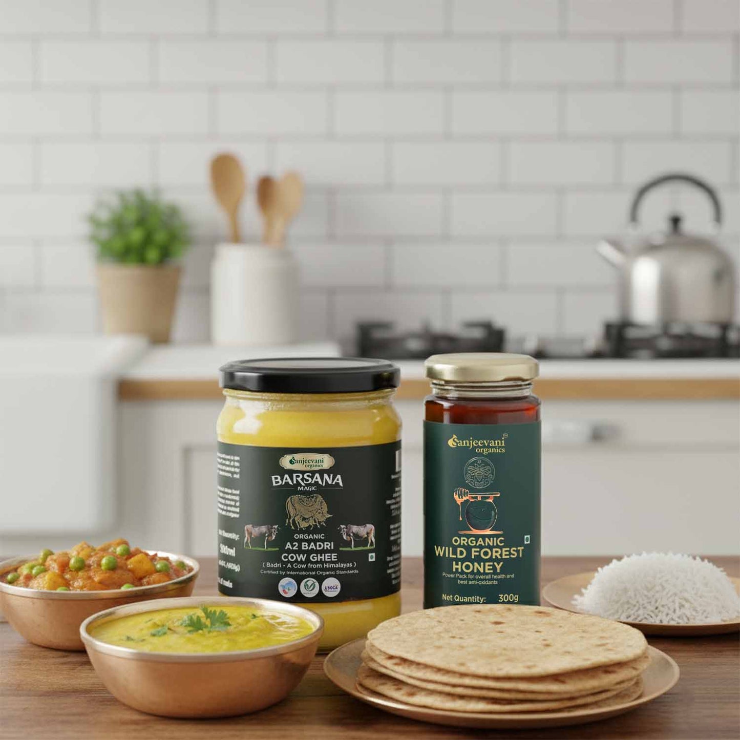 Barsana Magic and Jars of Barsana yogurt and organic honey on a kitchen counter with food items.