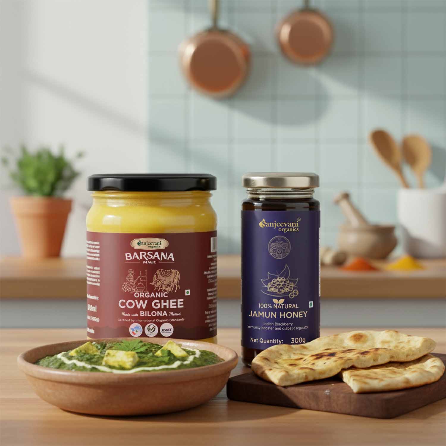 Barsana Magic and Two jars of organic cow ghee and jamun honey on a kitchen counter with food items.