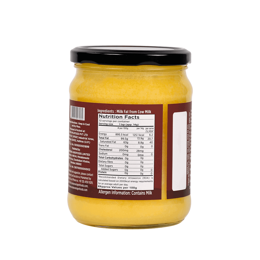 Golden-hued Organic Bilona Cow Ghee in a 500ML glass jar, crafted traditionally for purity and rich, nutty flavor.