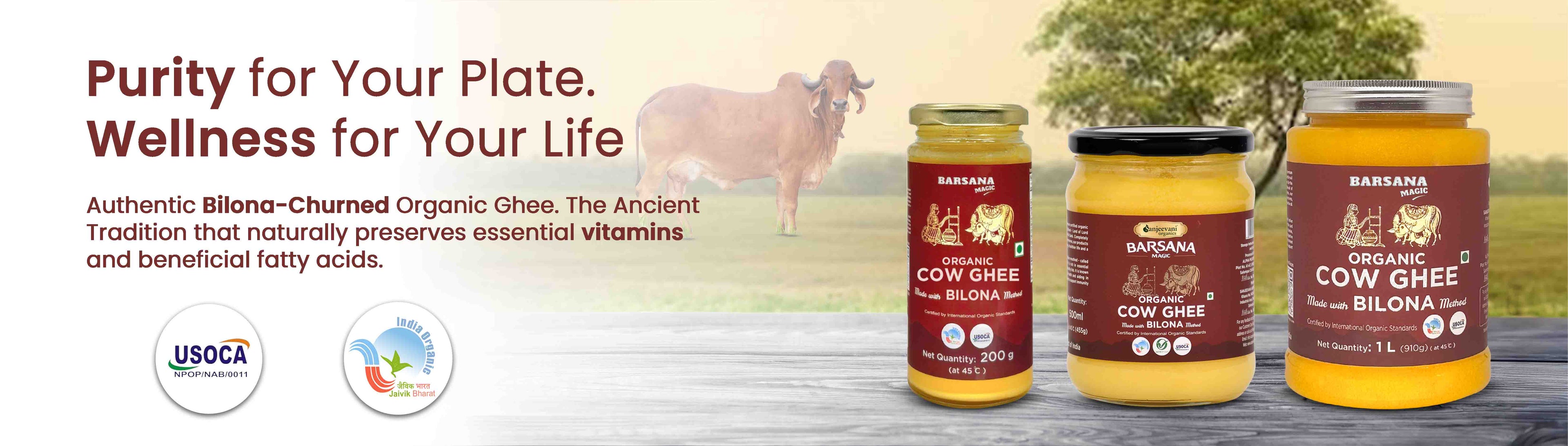 Barsana Magic and Three jars of organic ghee on a wooden surface with a cow in the background, featuring the USOC and USDA logos.