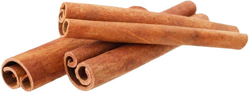Barsana Magic and Cinnamon sticks on a white background
