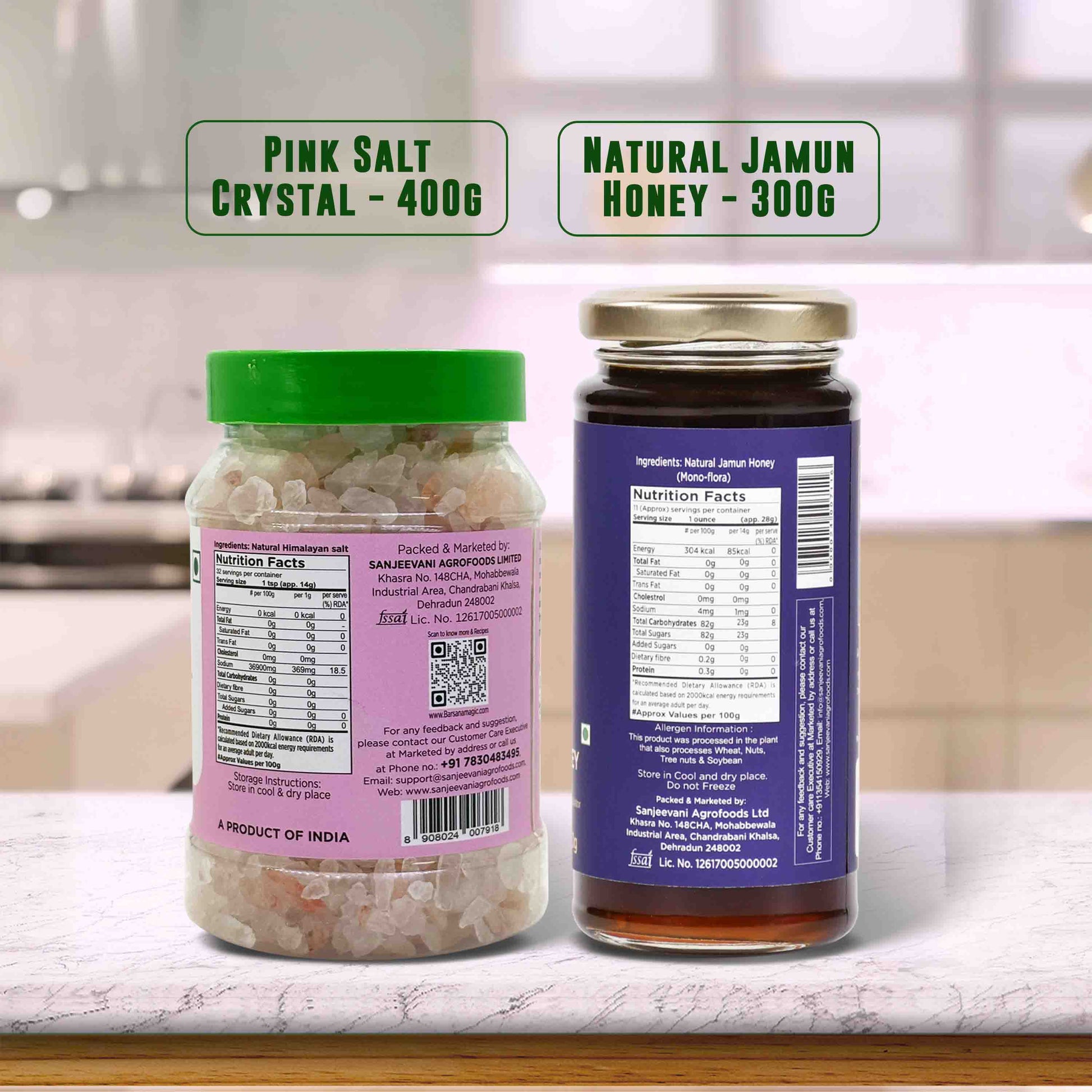 Barsana Magic and Two jars labeled 'Pink Salt Crystal' and 'Natural Jamun Honey' on a kitchen counter.