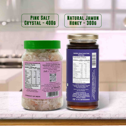 Barsana Magic and Two jars labeled 'Pink Salt Crystal' and 'Natural Jamun Honey' on a kitchen counter.