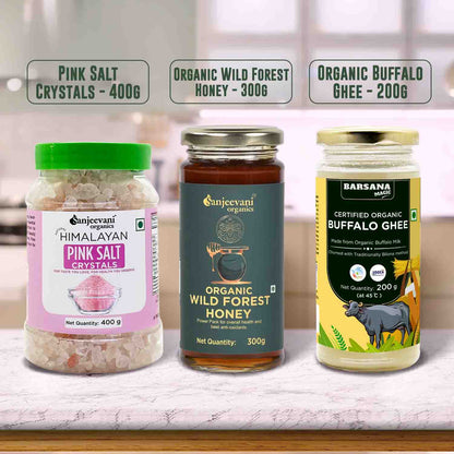 Barsana Magic and Three organic food products on a kitchen counter with labels indicating their names and quantities.