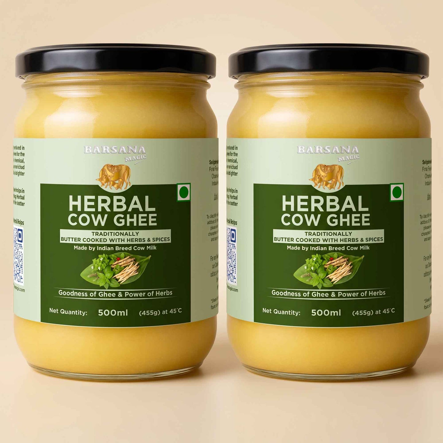 Barsana Magic and Two jars of Barsana Herbal Cow Ghee displayed side-by-side against a solid beige background. The jars are filled with a golden-yellow ghee and feature light green labels with dark green text panels, black lids, and a small illustration of a cow on each label.