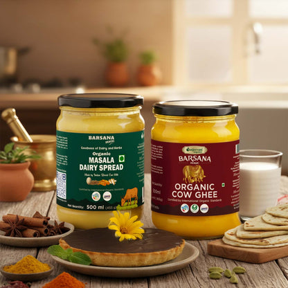 Barsana Magic and Two jars of Barsana Organic Dairy Spread on a wooden table with kitchen items in the background.