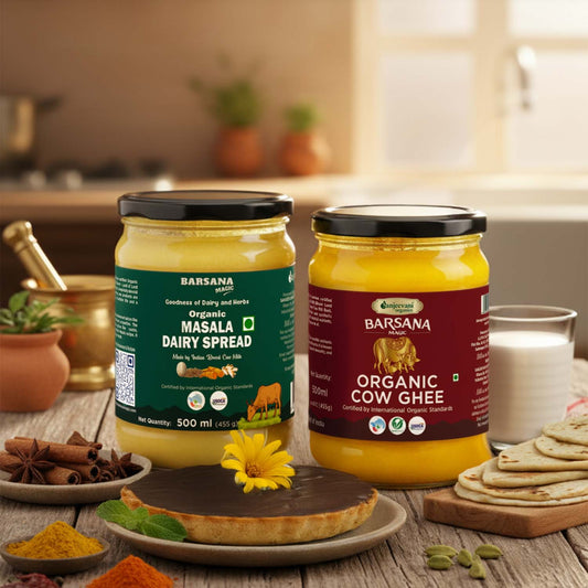 Barsana Magic and Two jars of Barsana Organic Dairy Spread on a wooden table with kitchen items in the background.