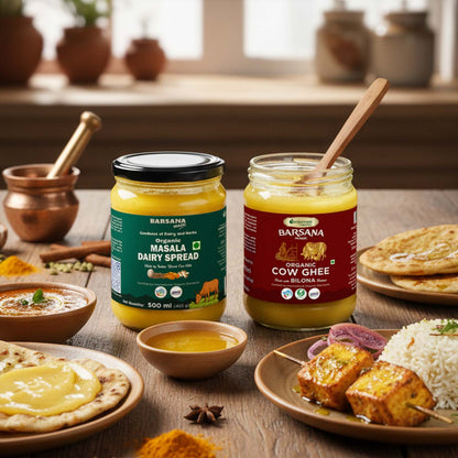 Barsana Magic and Two jars of Barsana dairy products on a wooden table with food items.