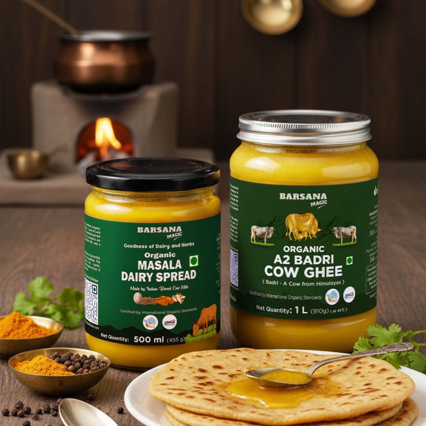 Barsana Magic and Two jars of Barsana dairy products on a wooden table with flatbread and spices.