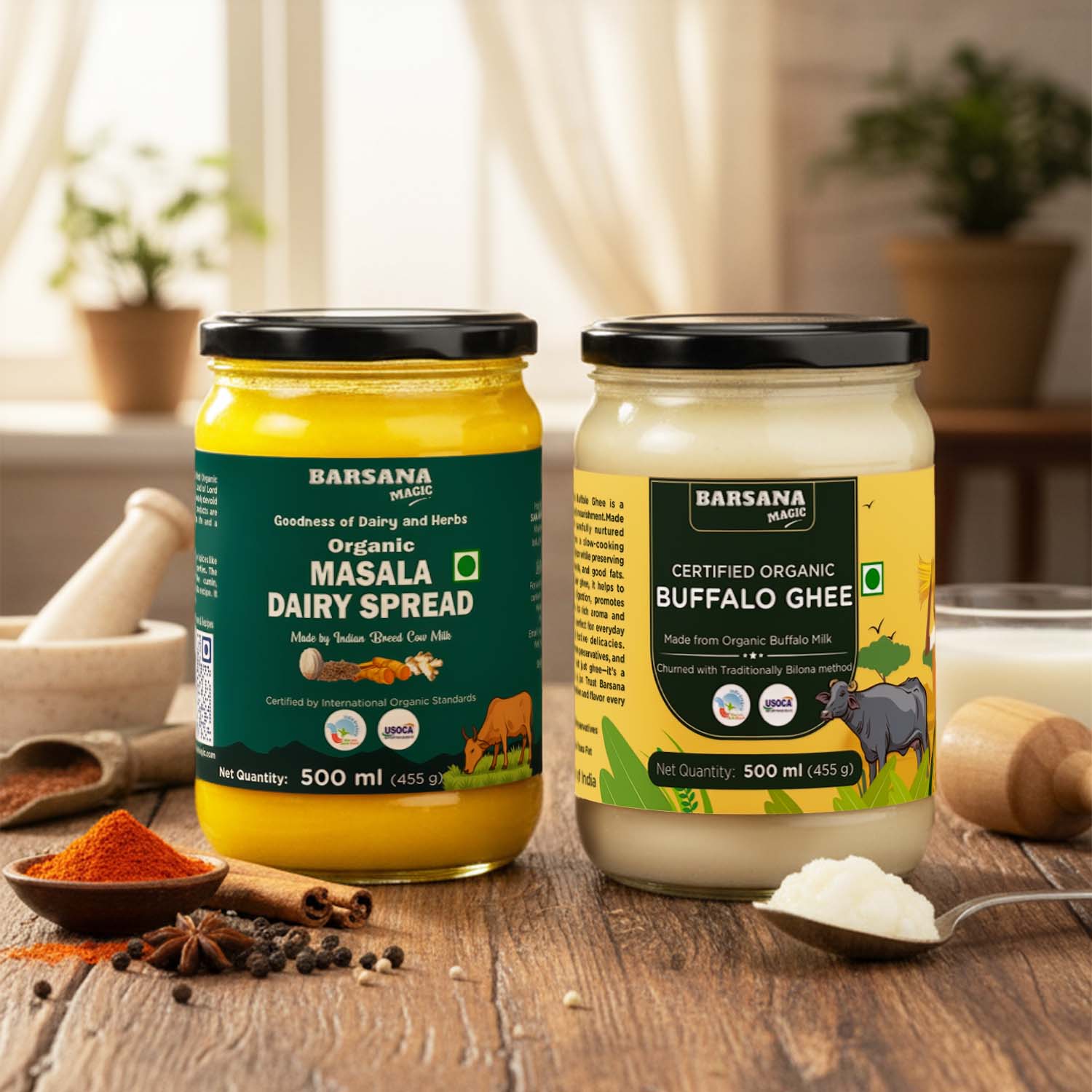 Barsana Magic and Two jars of Barsana Organic Dairy Spread on a wooden surface with spices and a spoon.