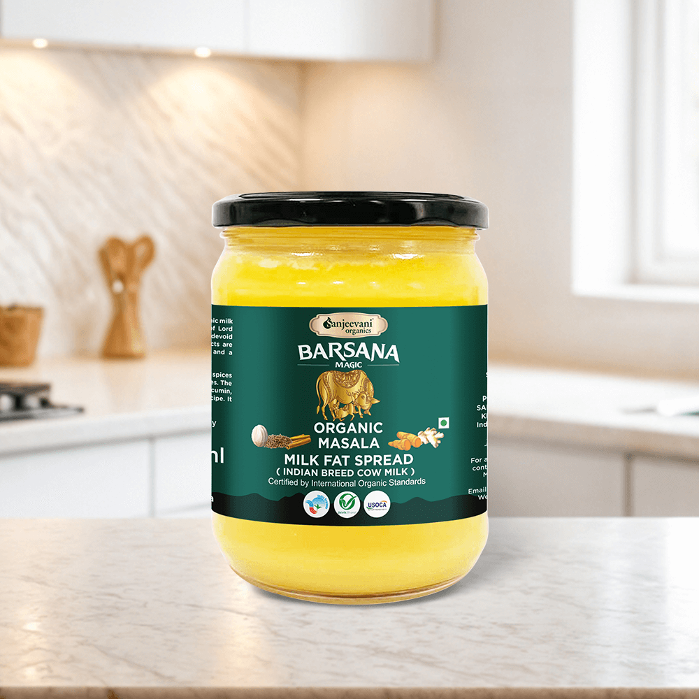 Savor the rich, golden hue of Barsana Magic Organic Masala Milk Fat Spread, infused with aromatic spices in a 500ml jar.